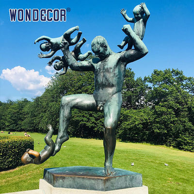 Adults And Children Playing Bronze Statues Sculpture In Outdoor Parks