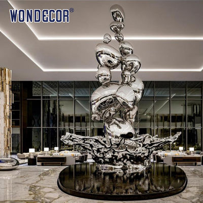 Large Forged Metal Sculpture Water Droplets And Splashes In Hotel Lobby