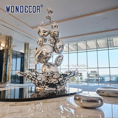 Large Forged Metal Sculpture Water Droplets And Splashes In Hotel Lobby