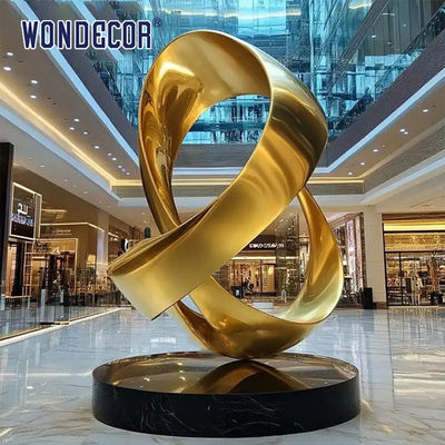 Large indoor hotel lobby Pop Art golden stainless steel statue