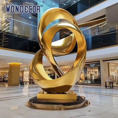 Large indoor hotel lobby Pop Art golden stainless steel statue