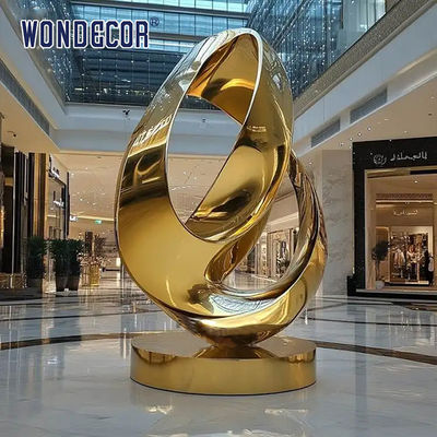 Large indoor hotel lobby Pop Art golden stainless steel statue