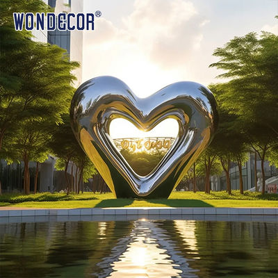 Large outdoor square modern abstract geometric hollow heart-shaped stainless steel sculpture
