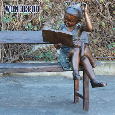 Custom Life Size A bronze statue of a girl sitting on a bench reading a book